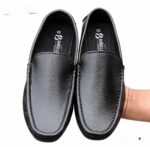 Black leather slip-on shoes for men